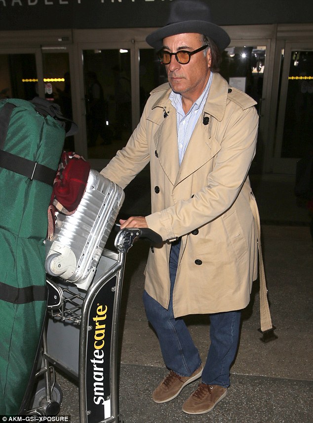 Sincere: Andy looked arrived at the Tom Bradley International Terminal at LAX