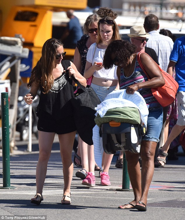Newborn: Edward's wife Shauna Robertson, left, and a family friend were seen with a baby's car seat in St. Tropez in July