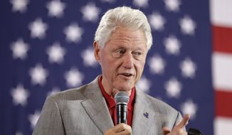 &quot;You&#39;ve got this crazy system where all of a sudden 25 million more people have health care and then the people are out there busting it, sometimes 60 hours a week, wind up with their premiums doubled and their coverage cut in half,&quot; Bill Clinton said. &quot;It&#39;s the craziest thing in the world.&quot; (Associated Press)