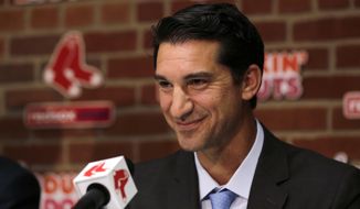 FILE - In this Sept. 24, 2015, file photo, Boston Red Sox newly appointed general manager Mike Hazen smiles at Fenway Park in Boston. The Arizona Diamondbacks have named Hazen as executive vice president and general manager. The team announced the hiring in a news release on Sunday, Oct. 16, 2016. (AP Photo/Charles Krupa, File)