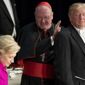 From left, Democratic presidential candidate Hillary Clinton, Cardinal Timothy Dolan, Archbishop of New York, and Republican presidential candidate Donald Trump, arrive at the 71st annual Alfred E. Smith Memorial Foundation Dinner, a charity gala organized by the Archdiocese of New York, Thursday, Oct. 20, 2016, at the Waldorf Astoria hotel in New York. (AP Photo/Andrew Harnik)