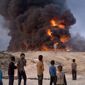 clouded: Islamic State fighters have ignited oil wells outside Mosul to create a smokescreen for U.S.-backed Iraqi and Kurdish forces. A successful liberation of Iraq&#39;s second-largest city would bolster President Obama&#39;s legacy of leading from behind. (Associated Press)