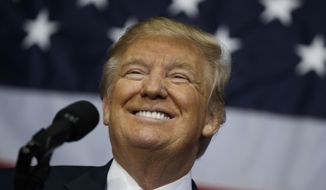 Republican presidential candidate Donald Trump smiles during a campaign rally at the Delaware County Fair, Thursday, Oct. 20, 2016, in Delaware, Ohio. (AP Photo/ Evan Vucci)