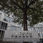 The United Nations Educational Scientific and Cultural Organization logo is pictured on the entrance at UNESCO&#39;s headquarters in Paris, Monday Oct. 17, 2016. UNESCO&#39;s executive board has approved on Tuesday a resolution that Israel says denies the deep historic Jewish connection to holy sites in Jerusalem _ and that has angered Israel&#39;s government and many Jews around the world. (AP Photo/Francois Mori)