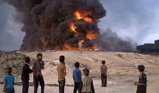 clouded: Islamic State fighters have ignited oil wells outside Mosul to create a smokescreen for U.S.-backed Iraqi and Kurdish forces. A successful liberation of Iraq&#39;s second-largest city would bolster President Obama&#39;s legacy of leading from behind. (Associated Press)