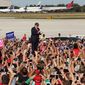 Donald Trump arrives at a Trump rally at Sanford Orlando International Airport in Sanford, Fla., Tuesday, Oct. 25, 2016. Trump is pledging to bolster the government&#39;s investment in the space program, a boon to the Space Coast of Florida. (Stephen M. Dowell/Orlando Sentinel via AP)