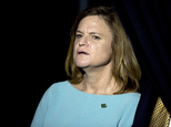 In this Oct. 30, 2016, file photo Hillary Clinton campaign Director of Communications Jennifer Palmieri stands off stage during a rally for Democratic presidential candidate Hillary Clinton at The Manor Complex in Wilton Manors, Fla. Palmieri privately dismissed FBI Director James Comey as ¿a bad choice¿ in October 2015, according to hacked emails published Nov. 3. The blunt assessment foreshadowed the dramatic tension that has escalated between Comey and the Democratic presidential candidate in the final days before the election.(AP Photo/Andrew Harnik)