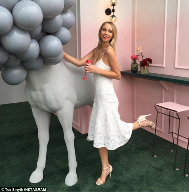 Horsing around: Former Big Brother contestant Tully Smyth looked demure in lace as she posed with a horse statue at Friday's launch
