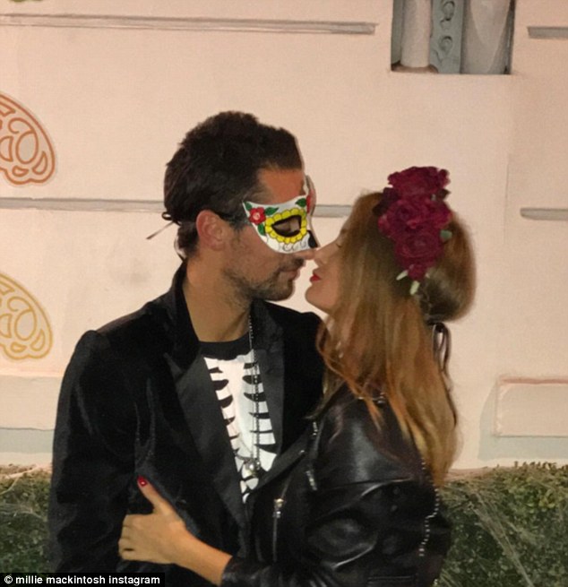Loved-up: Millie was out celebrating Halloween with her new love Hugo Taylor - who she confirmed she had reunited with in May, after a brief romance in 2011 