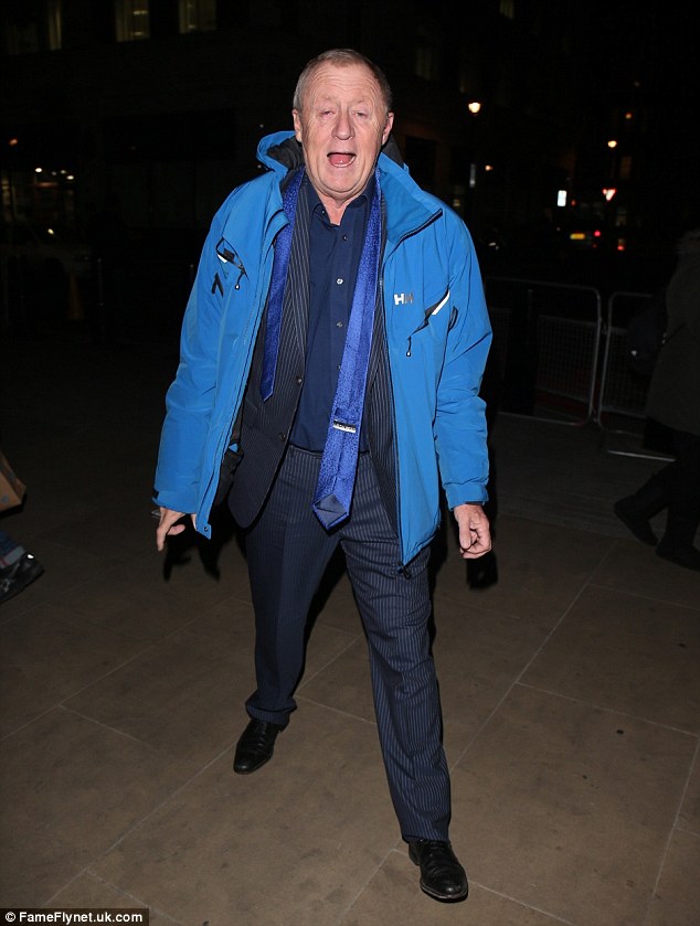 Keeping warm: The presenter wrapped up against the November chill in a blue padded jacket
