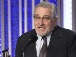 Robert De Niro included a plug for Hillary Clinton as he accepted his award (Invision/AP)