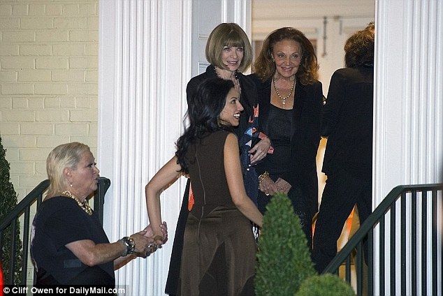 Fund-raiser: Wintour and Furstenberg are seen greeting Clinton aide Huma Abedin at a  campaign fundraiser. The three hosted the pre-election shindig togeter