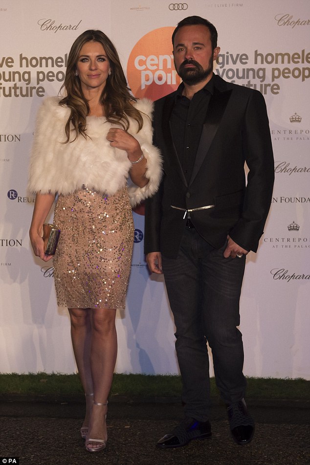 Dapper companion: She was accompanied on the red carpet by media tycoon  Evgeny Lebedev, who looked the epitome of suave sartorial styling in his evening dress