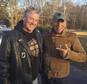 In this Friday, Nov. 11, 2016, photo provided by Ryan Bailey, Dan Barkalow, left, and Bruce Springsteen poses for a photo in Wall Township, N.J. Barkalow and a group from the Freehold American Legion was riding after a Veterans Day event Friday when they pulled over to help a stranded motorcyclist who turned out to be The Boss. (Ryan Bailey via AP)