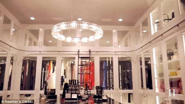 Let there be light: So immense is this walk-in wardrobe that it's got a chandelier