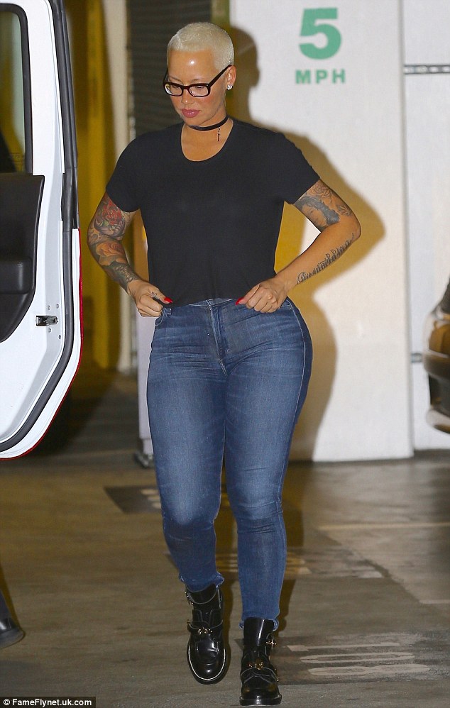Casual cool: Amber Rose was spotted paying another visit to BFF Blac Chyna and her new daughter in Los Angeles on Friday