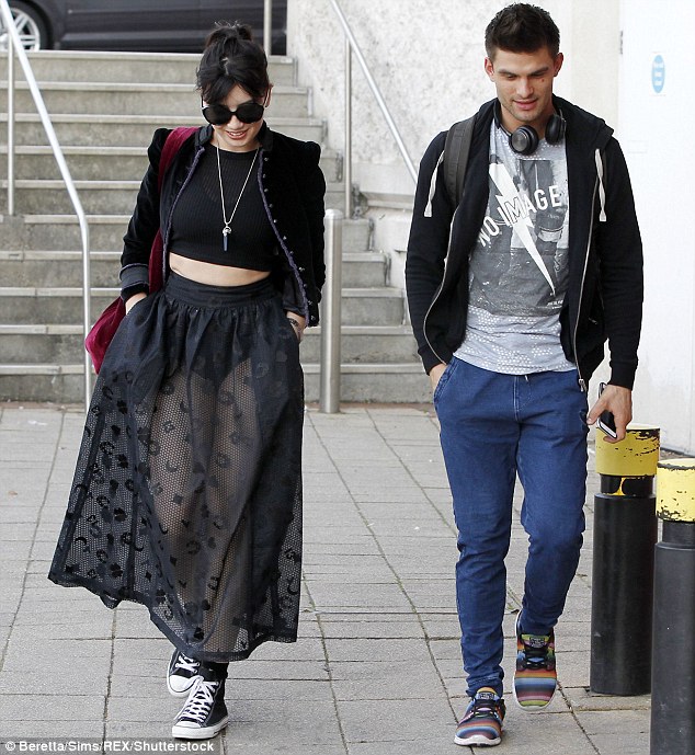 Laid back style: 26-year-old Aljaz looked equally chilled as he accompanied Daisy to the dance studio, wearing jeans, a marl T-shirt and a black hoodie top