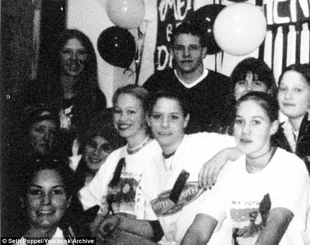 Sherri (third from right in white), pictured her junior year of high school, was in the same class as Tera's sister Kyra who was a year younger