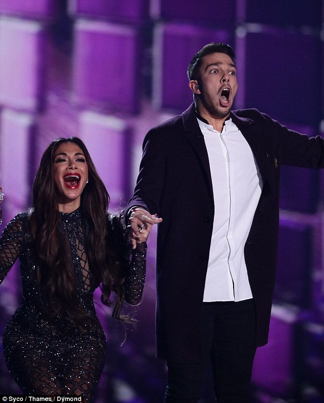 Disbelief: Matt was left astounded as he discovered he had beat fellow hopeful Saara Aalto, 29, after the duo battled it out in the live show in Wembley Arena