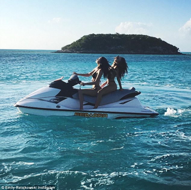 'Love': Emily posed for another photo with Bella in between jet skiing