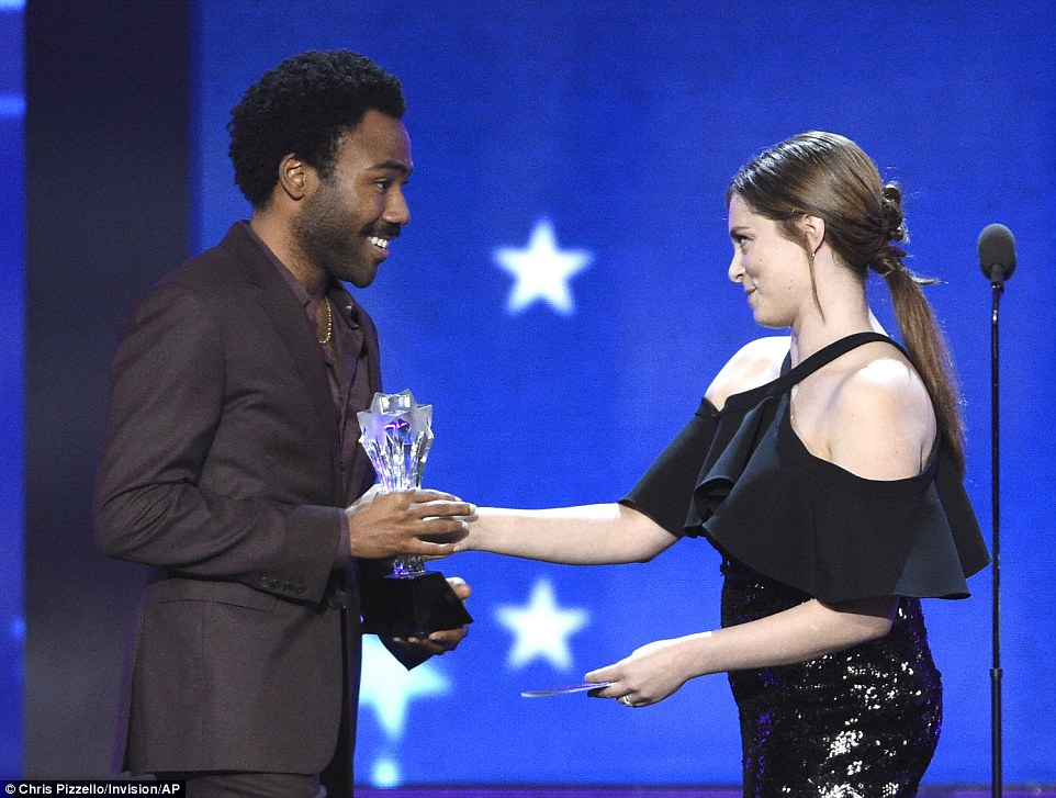 Excited: The rapper and actor was given the award by actress Rachel Bloom