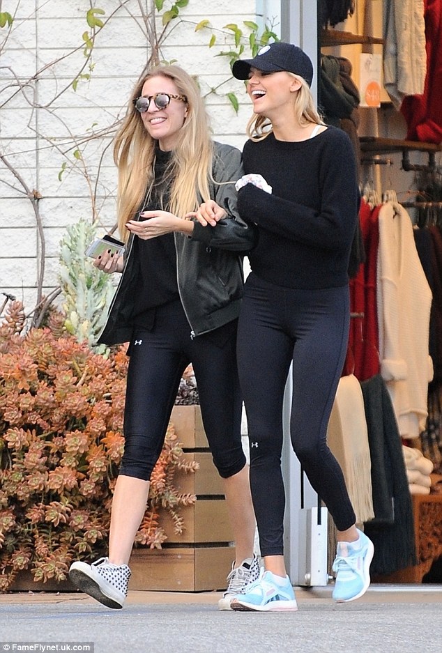 Lols: The 26-year-old actress and her fashionista friend made simple trip to the store into a giggle-filled adventure