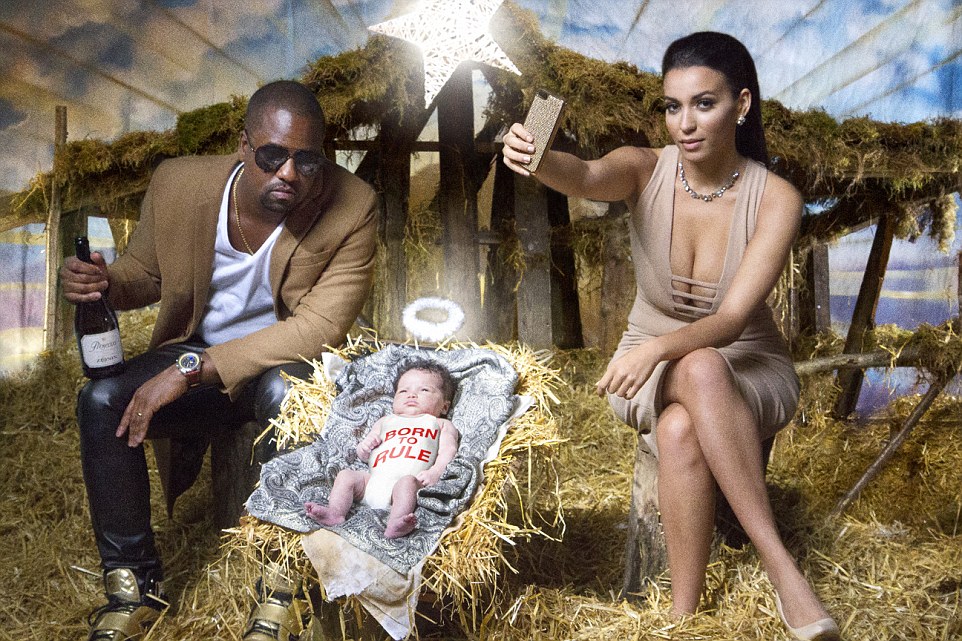 Kim Kardashian and Kanye West take on the role of Mary and Joseph with their son Saint West acting as Jesus