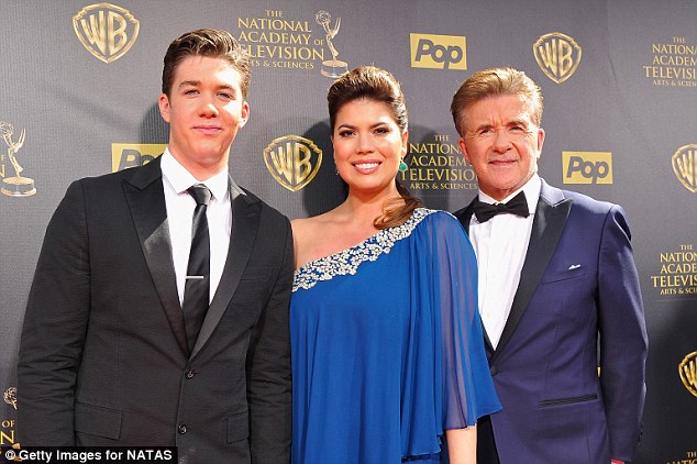 Thicke (right) pictured with his son Carter and wife Tanya Callau last April. Thicke was reportedly playing hockey with Carter when he suffered a heart attack on Tuesday
