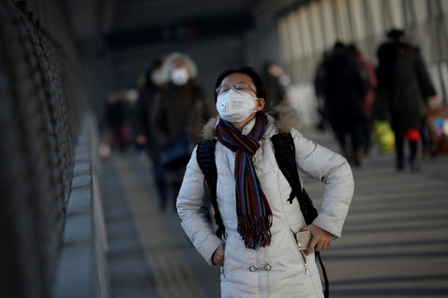 Heavy air pollution in China has caused a spike in hospital visits, closed roads and forced the cancellations of flights