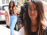 Malia Obama wore high-waisted jeans and a crop top as she showed up to work Wednesday morning to intern at the Weinstein Company in New York City