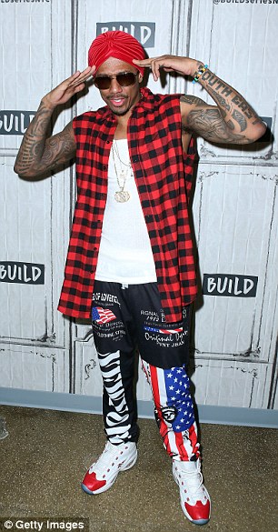 Work it: Showing off his patriotic side, the If I Was Your Man hitmaker donned a pair of baggy tracksuit bottoms featuring the stars and stripes and a motif of the Statue of Liberty on one leg