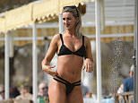 Peru Two drugs mule Michaella McCollum has been seen relaxing on the beach in Spain (pictured)