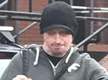 Blinded for life: Daniel Rotariu, pictured  leaving court, was left blinded and scarred for life after his girlfriend allegedly recruited her ex lover to throw sulphuric acid into his face, Leicester Crown Court heard