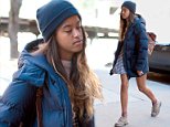 Spring has sprung: Malia Obama enjoyed the unseasonably warm weather on Thursday in New York City by baring her legs in a baby doll dress (above)