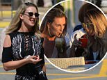 Peru drugs mule Michaella McCollum, left, flew into Ibiza today along with a friend, right, and headed straight to a bar in Mambos to watch the sunset go down over the island 