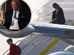 Melania Trump dressed arrives at West Palm Beach International Airport Thursday alongside son Barron Trump. President Trump flew separately aboard Air Force One