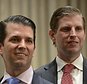 FILE- In this Feb. 28, 2017 file photo, Donald Trump Jr., left, and his brother Eric Trump attend the grand opening of the Trump International Hotel and Tower in Vancouver, B.C., Canada. Apprentices no more, Eric Trump and Donald Trump Jr. are now at the helm of the Trump Organization and adjusting to the reality presented by their father's presidency. (Jonathan Hayward/The Canadian Press via AP, File)