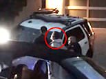 Conrad Hilton, the brother of Paris Hilton, is seen in the video footage above as he is being arrested by police in Los Angeles at around dawn on Saturday. Hilton is wearing a light-colored hooded sweater as he stands before a police officer