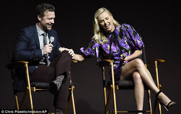 Busy schedule: The actress also shared a giggle with Atomic Blonde director David Leitch during the Universal Pictures presentation