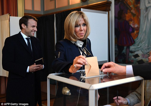 Pictured: The Macrons vote at the Le Touquet town hall, the place they had married 10 years before