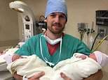 The North Carolina couple who lost their two sons in a car crash two years ago welcomed twin boys on Monday. Above, Gentry Eddings poses with his new sons Isaiah Dobbs and Amos Reed