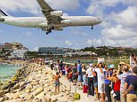 A woman has been killed after she fell and hit her head when the force of a jet flying overhead blew her from her feet at a world famous beach (pictured) in Saint Maarten, the Caribbean
