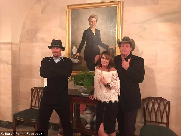 In April, Kid Rock (left) made headlines when he visited the White House with former Alaska governor Sarah Palin (center) and another musician, Ted Nugent (right). They are seen above mocking a portrait of former first lady Hillary Clinton