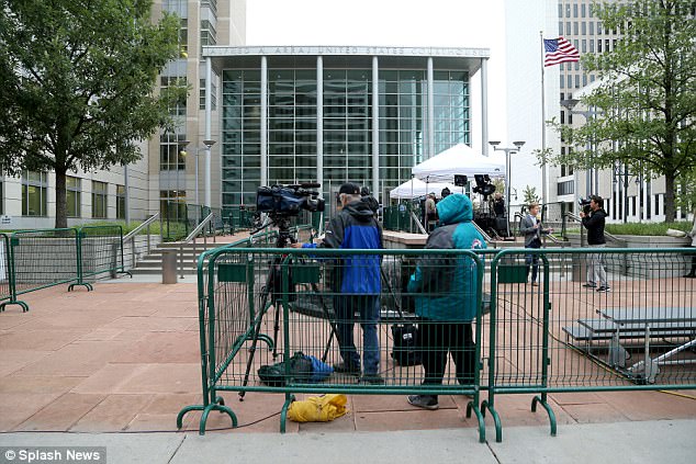 Media gather outside the Alfred A. Arraj United States Courthouse ahead of the Taylor Swift trial in Denver. Colorado