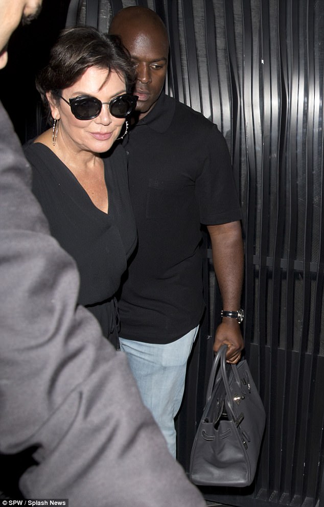 Loved-up:&nbsp;Kris Jenner, 61, looked happier than ever as she left Nobu restaurant in West Hollywood on Friday with her 36-year-old toyboy Corey Gamble in tow, who dutifully held her handbag