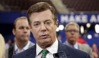 In this July 17, 2016, file photo, then-Trump Campaign Chairman Paul Manafort talks to reporters on the floor of the Republican National Convention in Cleveland. (AP Photo/Matt Rourke, File)