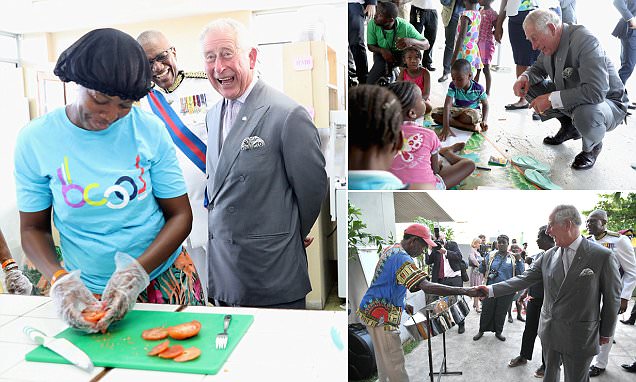Prince Charles lifts spirits as he visits shelter on tour