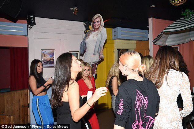 Centre stage! The girls were seen dancing around Gemma's cardboard cut-out