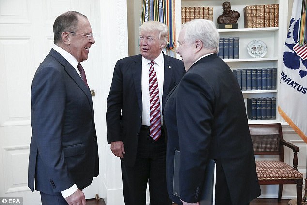 Trump is fighting a public backlash against revelations that he shared sensitive intelligence with Russia's foreign minister Sergey Lavrov (left) and ambassador to the U.S. Sergey Kislyak (right) during a meeting last week