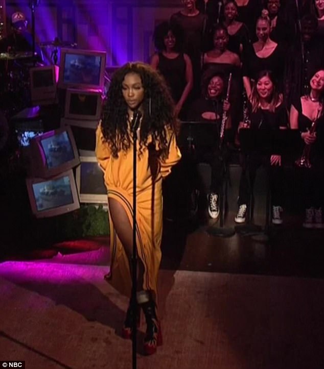 Encore: She came back with an unusual yellow sweatshirt dress for Love Galore